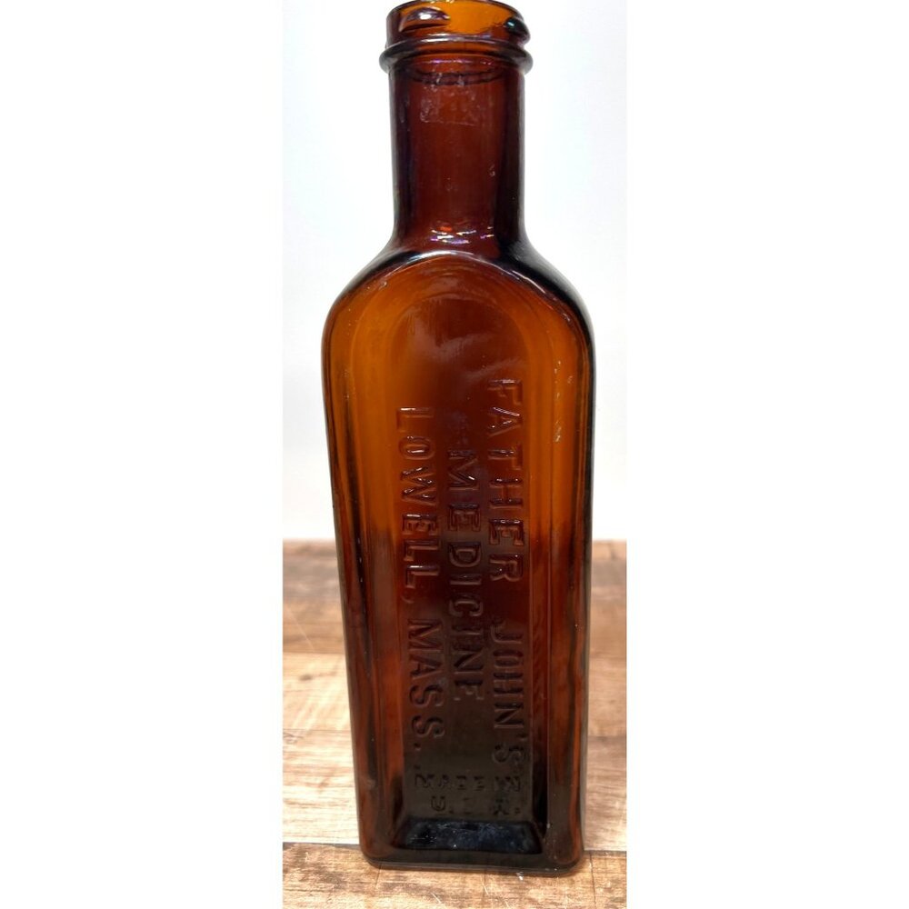 Antique Father Johns Medicine Amber Glass Bottle Lowell Mass Embossed
